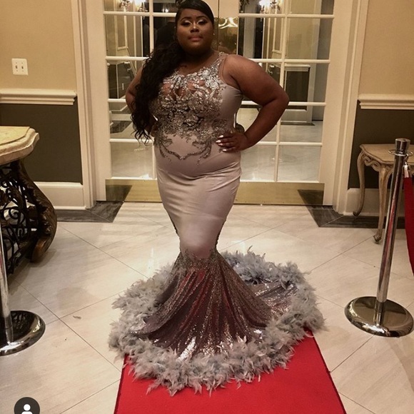 prom dress with feathers on bottom